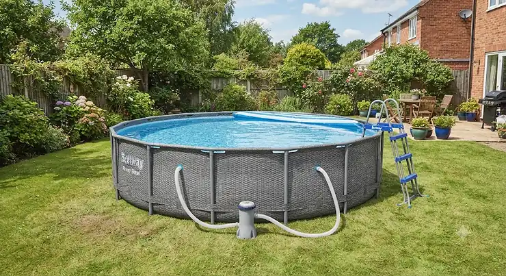 Bestway Power Steel 14ft pool with pump fully set up in a back garden on a sunny day