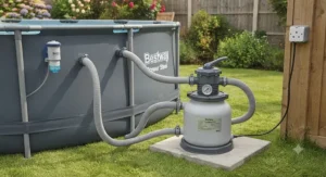 The filter pump and plumbing connection setup on a Bestway Power Steel above-ground pool.