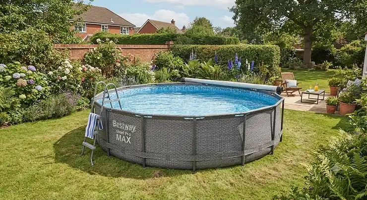 A Bestway Steel Pro MAX pool set up in a lush green British garden during summer.