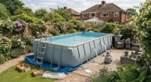 An easy to assemble rectangular above ground swimming pool in a residential backyard.