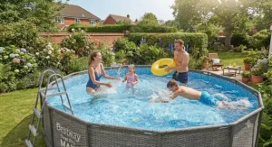 A family enjoying a swim in their Bestway Steel Pro MAX pool on a sunny day.