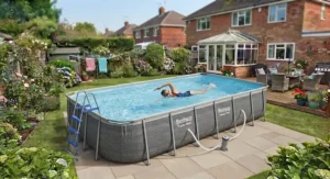 Adult swimming laps in a large family-sized Bestway Power Steel pool