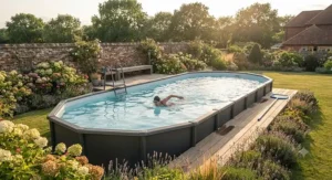 A large oval above ground pool suitable for swimming laps in the garden.
