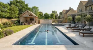 Luxury patio design featuring a bespoke rectangular pool for lap swimming.