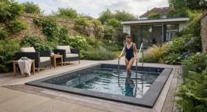 Luxury outdoor cold water plunge pool creating a home spa experience in a British garden