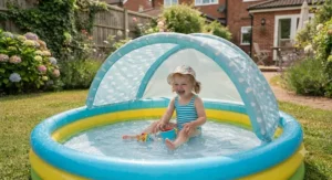 A small paddling pool for a 2 year old featuring a built-in sun canopy for protection during warm weather.