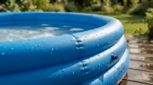 A baby pool with canopy showing flexible soft-sided walls for comfortable lounging and play