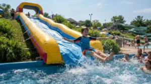 A large pool with slide for older kids featuring an extended slide length for faster sliding action.